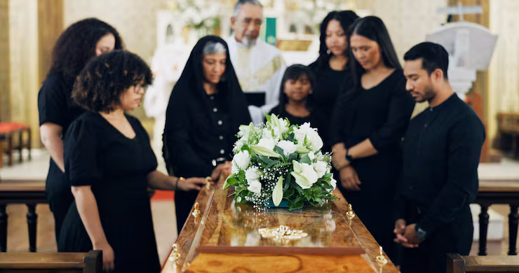funeral-family-coffin-with-flowers-church